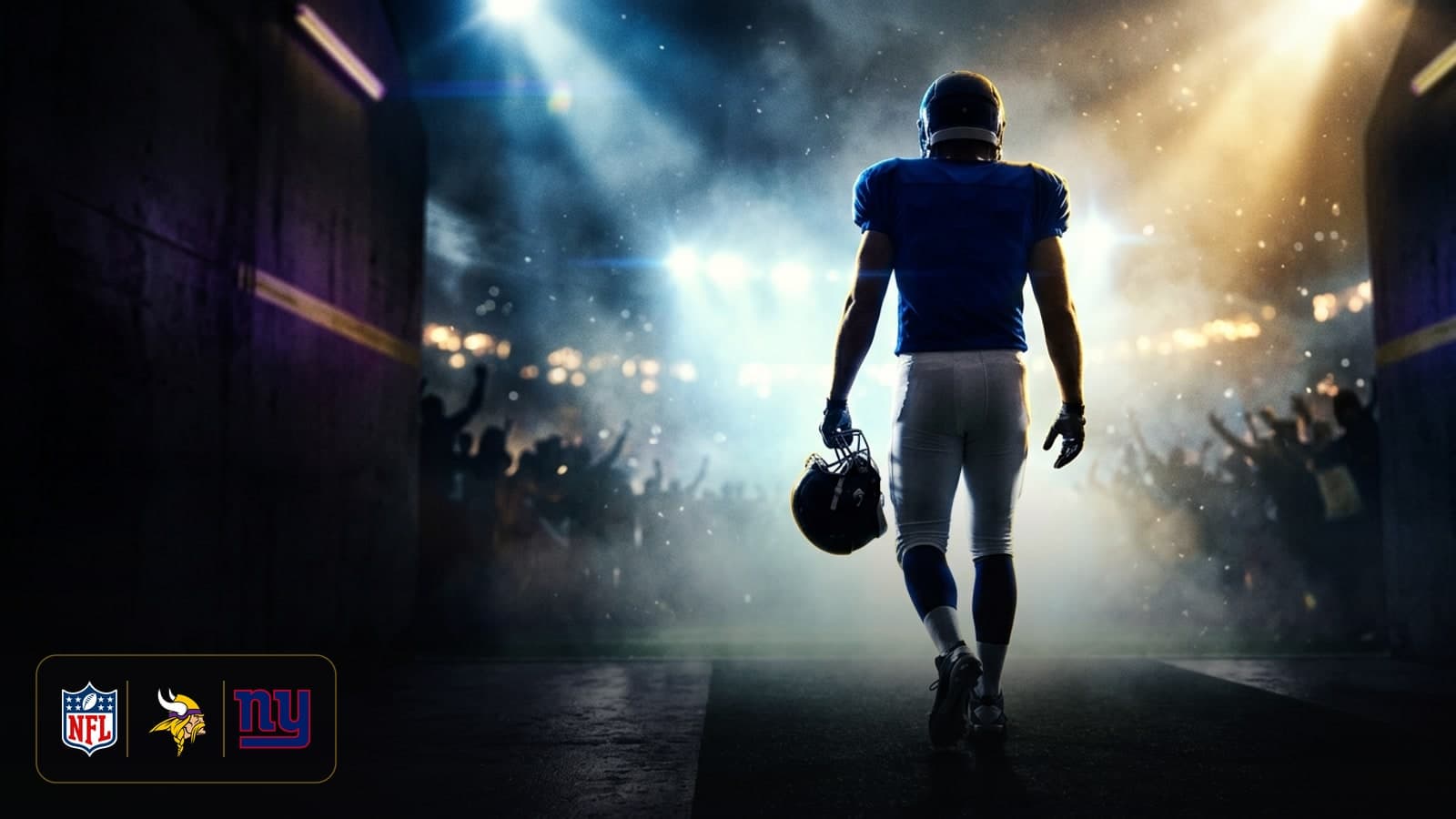 Football quarterback in silhouette standing in a stadium tunnel under dramatic amber stadium lights.